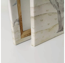 Detaljvy av två canvastavlor med elefantmotiv