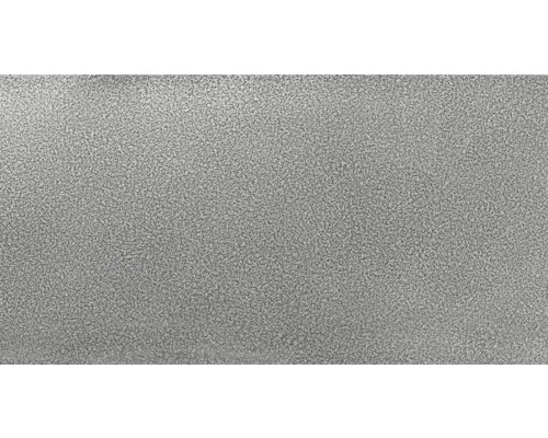 Närbild av en metallyta med hamrad effekt