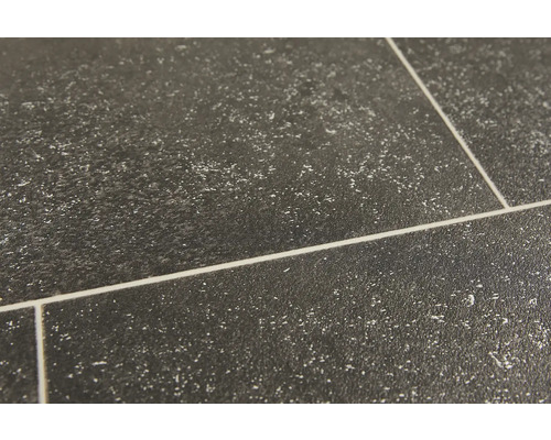 Närbild av golvplattor med matt yta