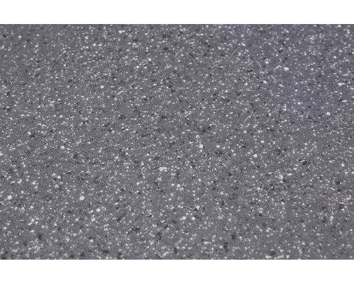 Närbild av en bänkskiva med prickig textur