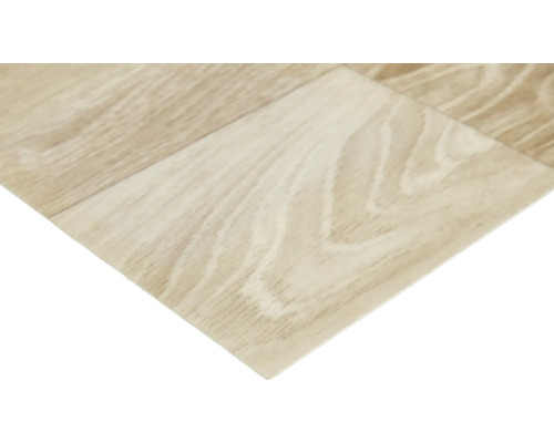 Närbild av en vinylgolvplatta med trästruktur