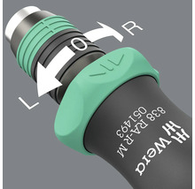 Detaljvy av omkopplingsspaken på en Wera skruvmejsel med etiketterna vänster, av och höger