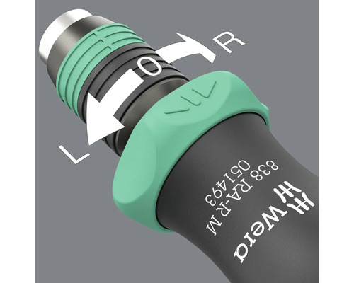 Detaljvy av omkopplingsspaken på en Wera skruvmejsel med etiketterna vänster, av och höger