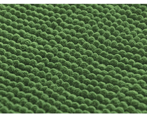 Närbild av en grön chenillematta