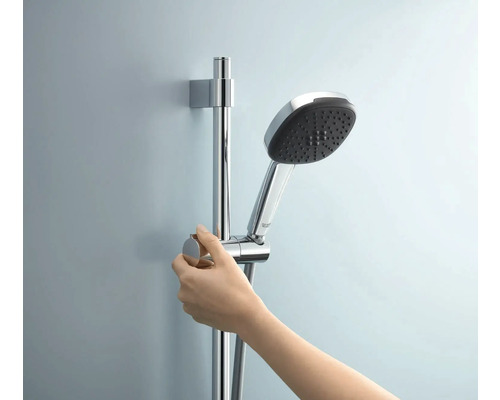 Handdusch på duschstång med hand