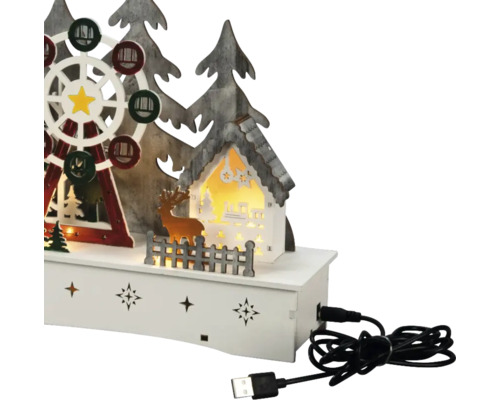 Juldekoration med pariserhjul, hus och USB-kabel