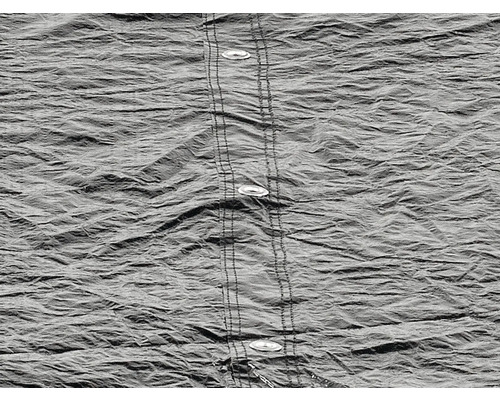 Grått tygmönster med knappar och söm