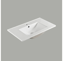 Tvättställ av keramik med kranhål och överlopp