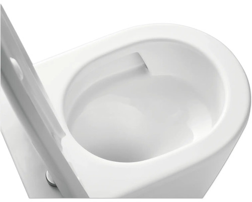 Detaljerad närbild av en vit keramisk toalett