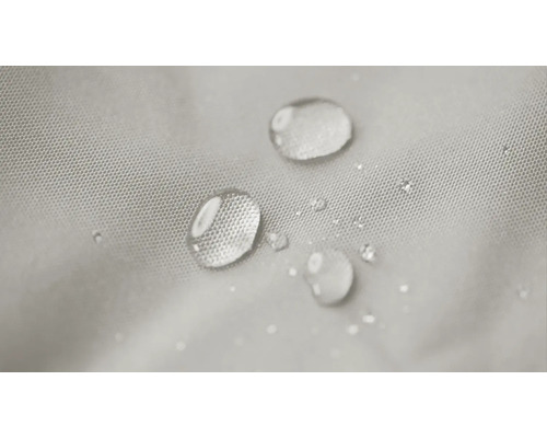 Vattenavvisande tyg med vattendroppar