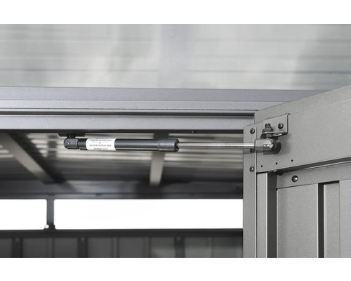 Gasfjäder för att underlätta öppningen av dörrar