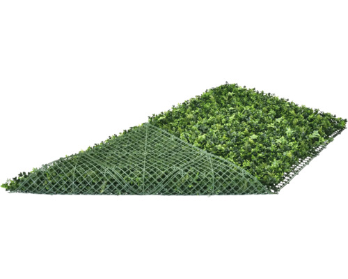 Konstgräsmatta med blad och rutstruktur på baksidan.