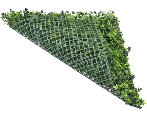 Konstgjord häck med grönt plastgitter