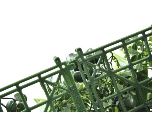 Konstgjord växt på plastgaller för dekoration