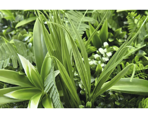 Konstgjord grön växtvägg med olika blad