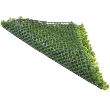 Konstgräsmatta med gröna blad på plastgaller