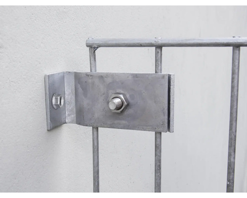 Fästelement för stängselelement på väggen