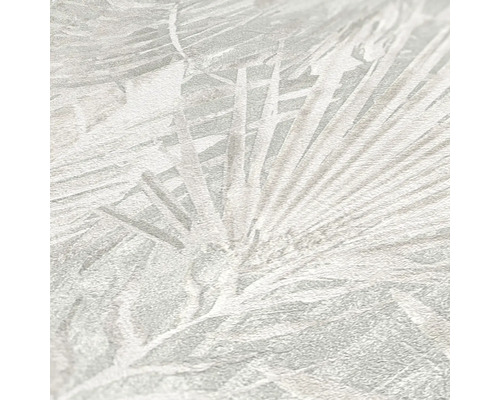 Närbild av en tapet med ett palmbladmönster