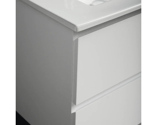 Detaljbild av ett underskåp för badrum med lådor