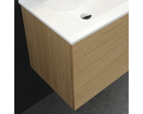 Tvättställsskåp med trästruktur och vitt handfat