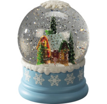 Snöglob med husmotiv och snöflingor