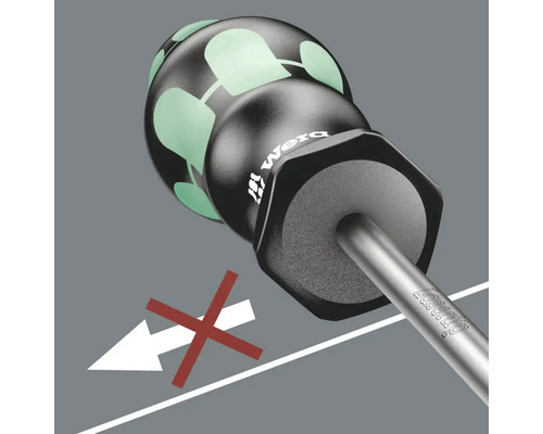 Närbild av en skruvmejsel med en speciell handtagsdesign och en illustration som indikerar att den inte ska användas för att hamra