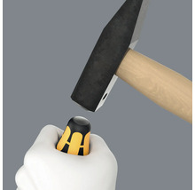 Hammare som slår på en bitshållare