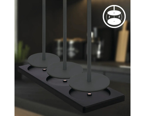 Tre lampor på ett svart fäste med symbol för magnetisk fastsättning