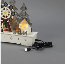 Dekorativ LED-lampa med julmotiv, inklusive ett pariserhjul, ett hus, träd och en hjort