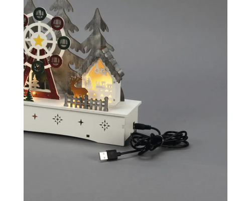 Dekorativ LED-lampa med julmotiv, inklusive ett pariserhjul, ett hus, träd och en hjort