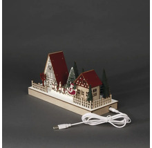 Juldekoration i trä med LED-belysning, bestående av hus, träd och jultomten i en släde med USB-kabel