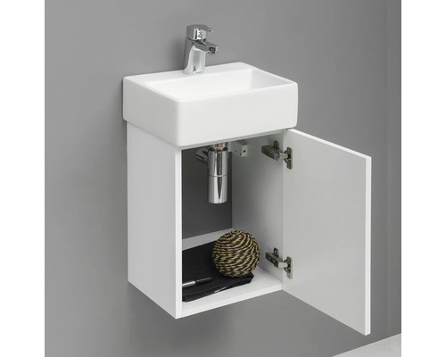 Tvättställ med underskåp och öppen dörr