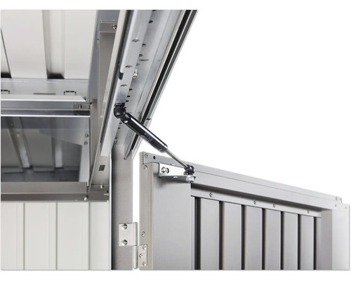 Detaljbild av en redskapslåda med gasfjäder för lockstöd.