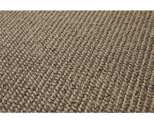 Närbild av en beige matta