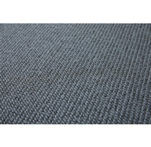 Närbild av en grå matta med textil struktur