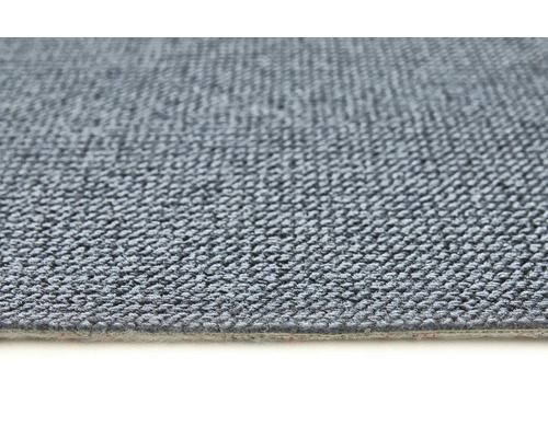 Närbild av en grå heltäckningsmatta