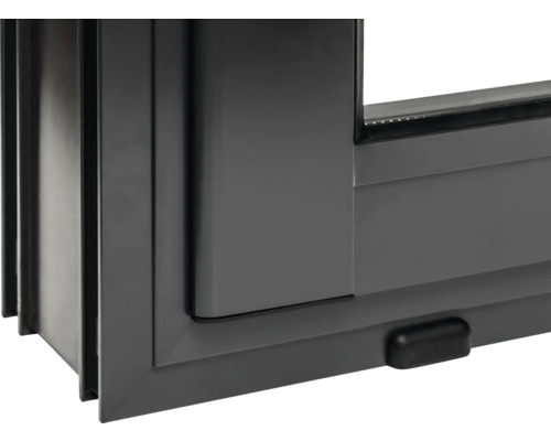 Detaljvy av ett skjutbart fönster med ram