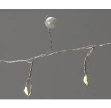 Dekorativ ljusslinga med tråd och pärla