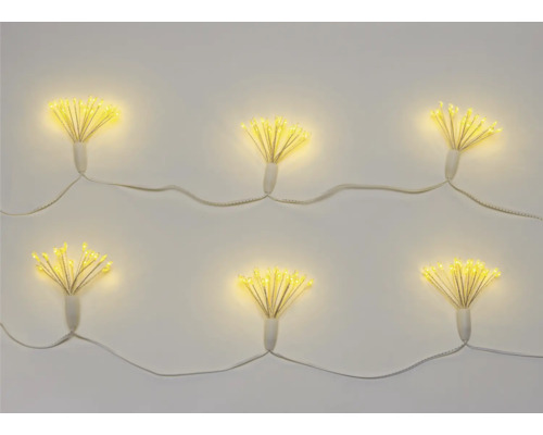 Dekorativ ljusslinga med LED-lampor i blomform