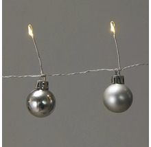 Ljusslinga med silverfärgade julkulor