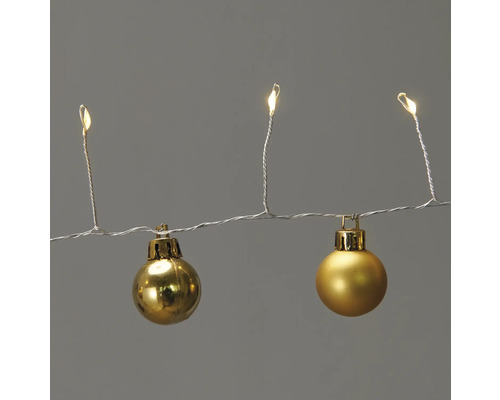 Ljusslinga med gyllene julkulor