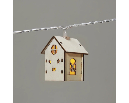 Ljusslinga med trähusmotiv