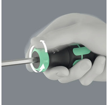 Närbild av en skruvmejsel med rotationsrörelsepilar