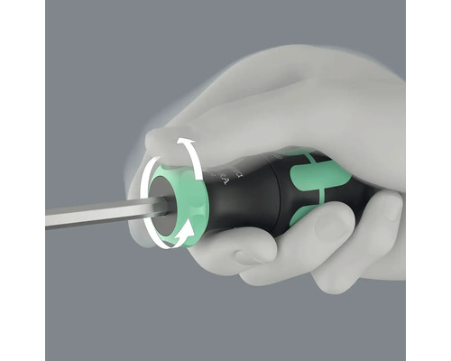 Närbild av en skruvmejsel med rotationsrörelsepilar