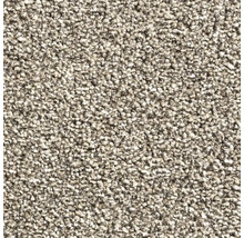 Närbild av en beige heltäckningsmatta