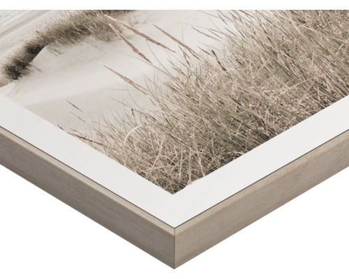 Inramad bild med strandmotiv