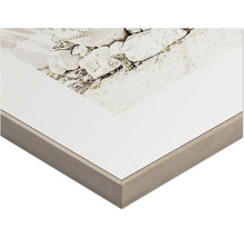 Detaljvy av en fotoram med stenmotiv