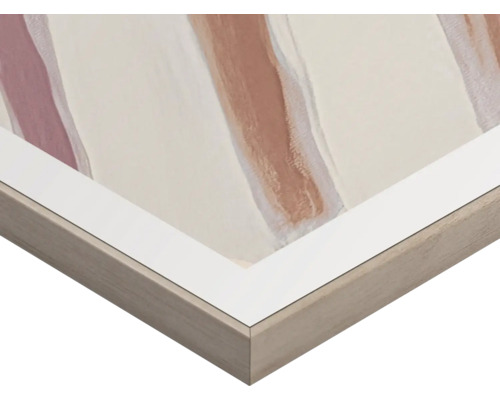 Närbild av en inramad bild med abstrakta färgaccenter