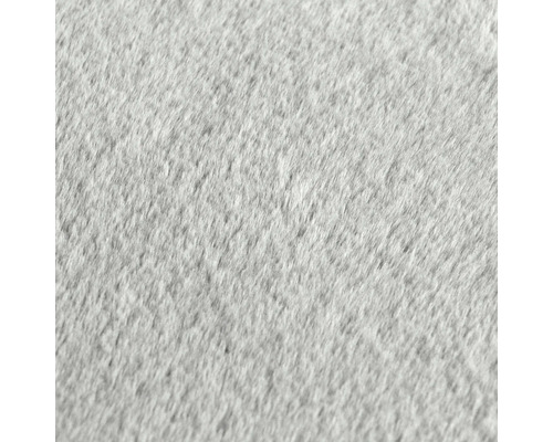 Detaljbild av en grå matta