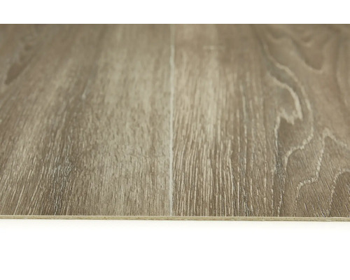 Närbild av ett vinylgolv med träutseende